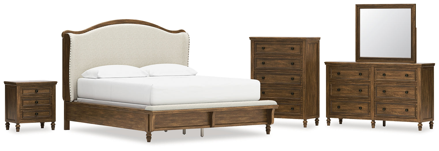 Sturlayne California King Upholstered Panel Bed with Mirrored Dresser, Chest and Nightstand